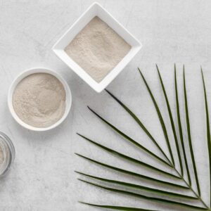 3 small bowls of Bentonite clay with a bamboo leaf as decoration